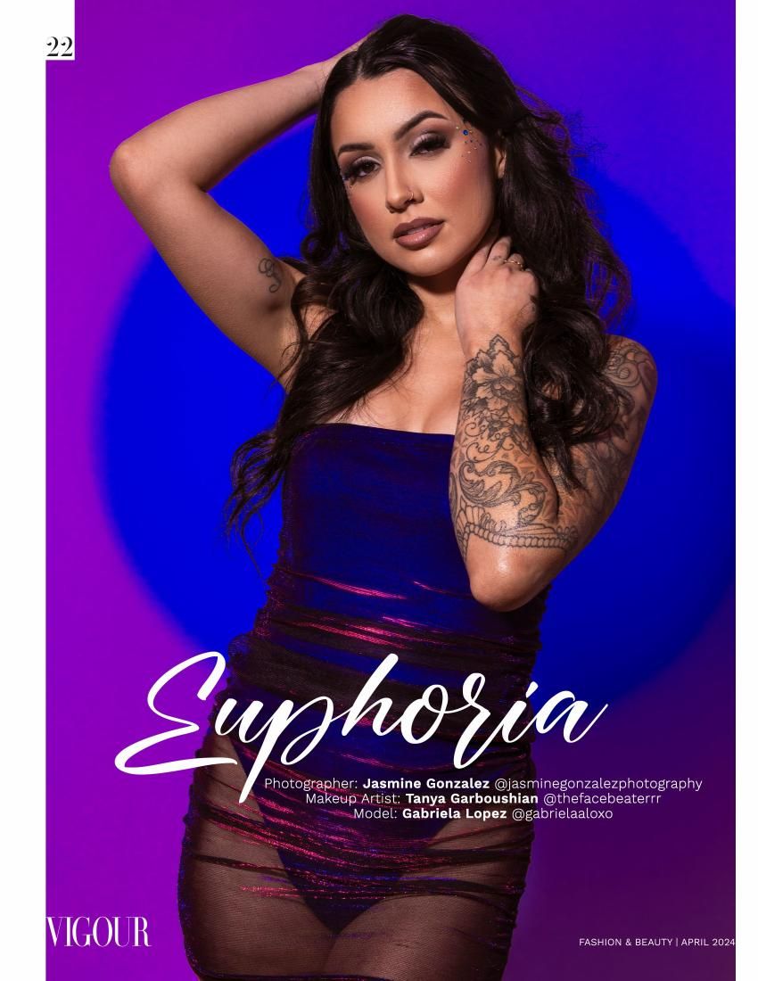 Fashion editorial photo against purple and blue gradient backdrop featuring glamorous pose with intricate arm tattoo.