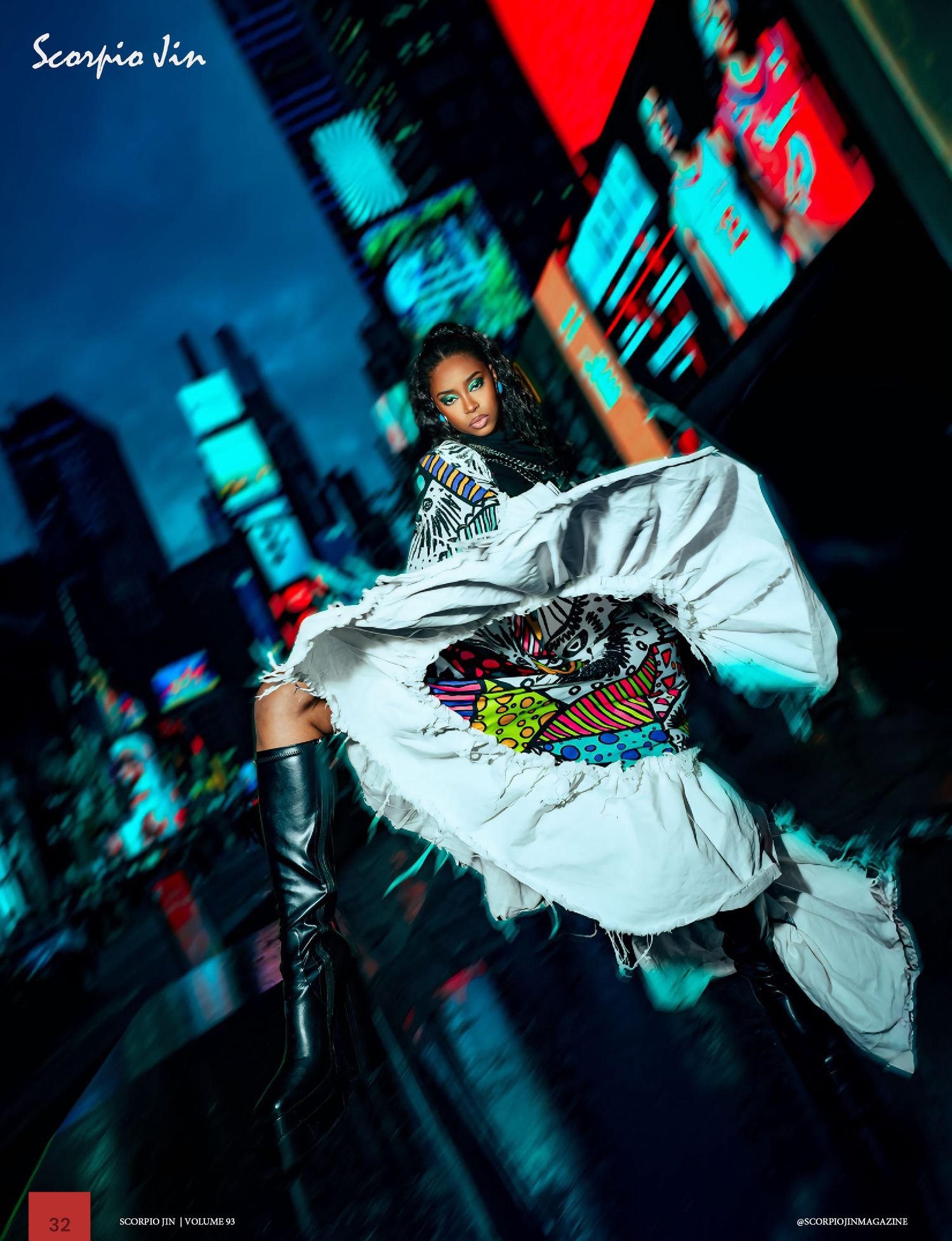Dynamic street fashion photo with model twirling in white windbreaker jacket against neon-lit urban nighttime backdrop.