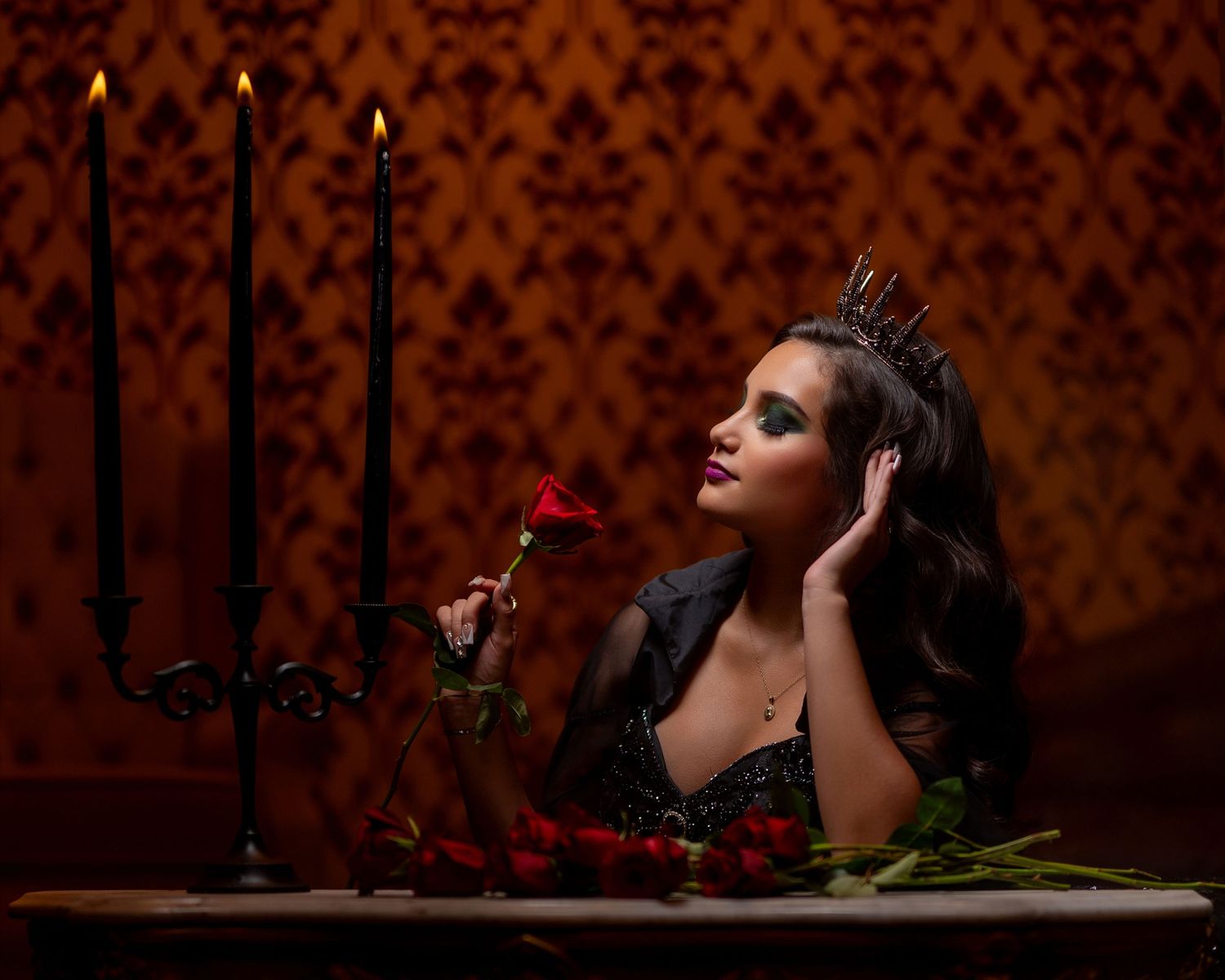 Gothic themed quinceañera portrait with crown and red rose in Sacramento studio | The Padillas