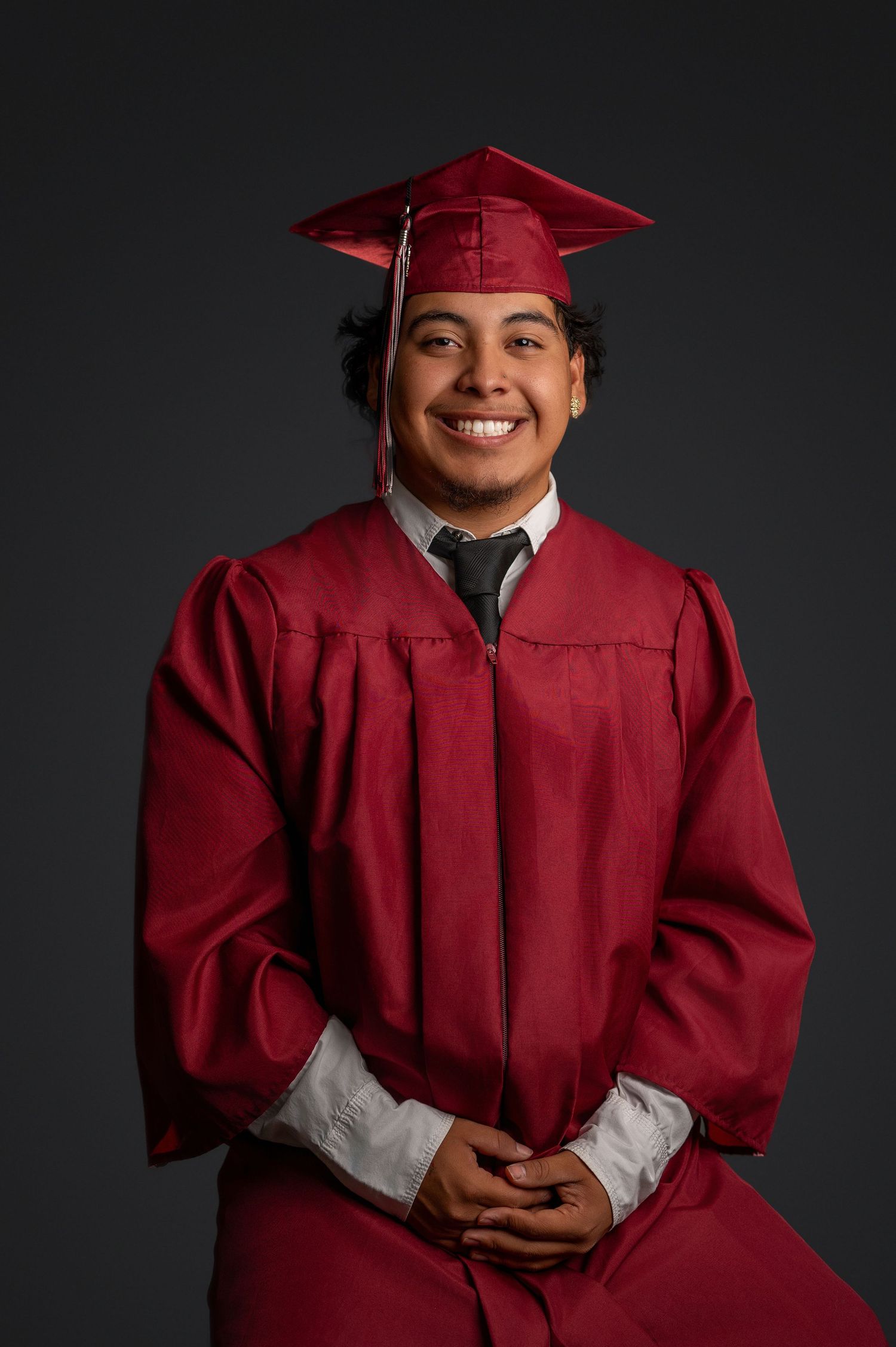 High school senior graduation portrait in cap and gown by The Padillas Sacramento senior photographers.