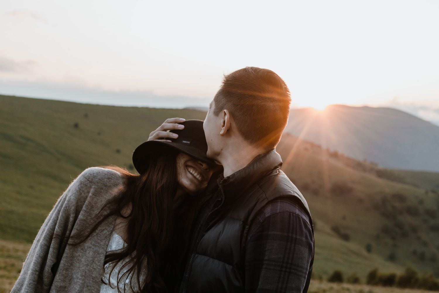 Intimate moment captured during golden hour on mountainside.