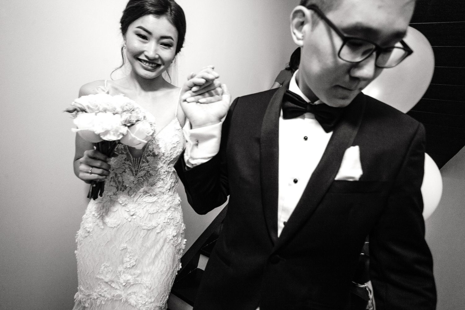 Elegant black and white portrait shots capturing formal attire and emotional wedding moments.