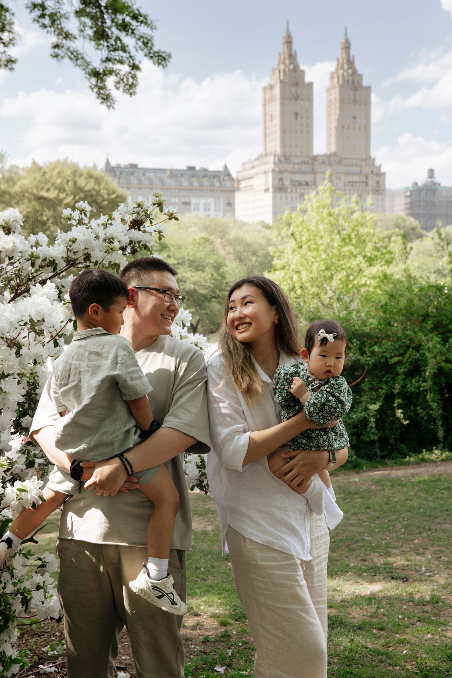 Family portrait in Central Park with the iconic San Remo towers in the background.