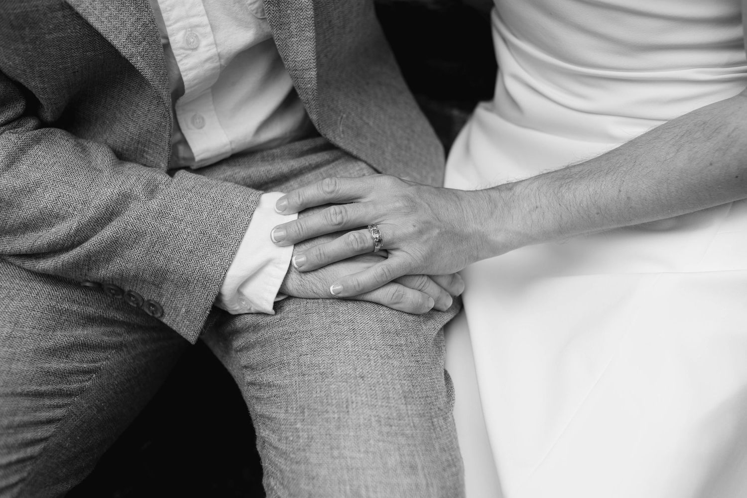 the bride and groom holding hands