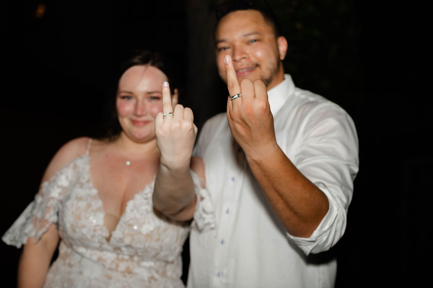 bride-groom-showing-wedding-rings