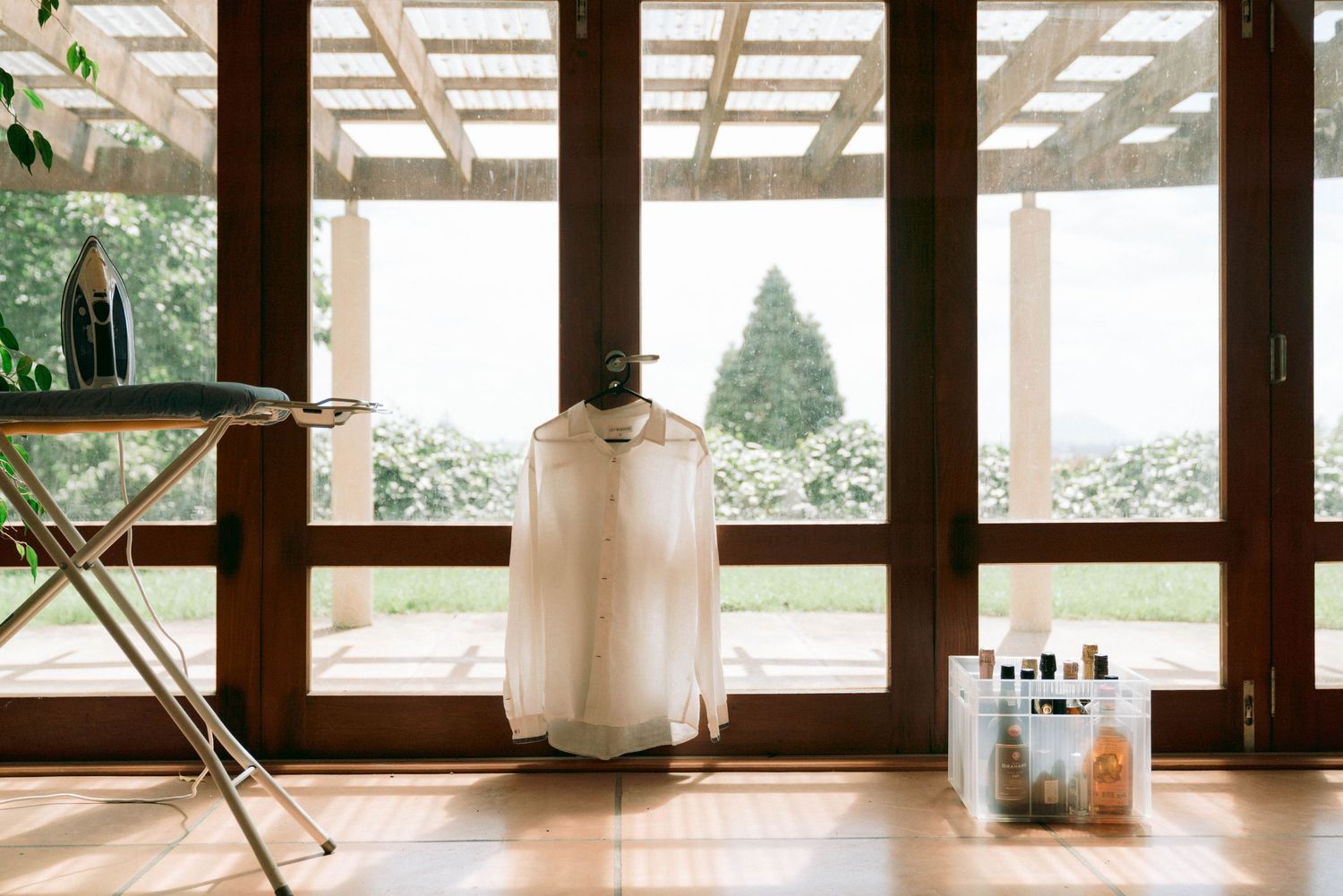 Modern interior space with panoramic windows overlooking scenic nature views.