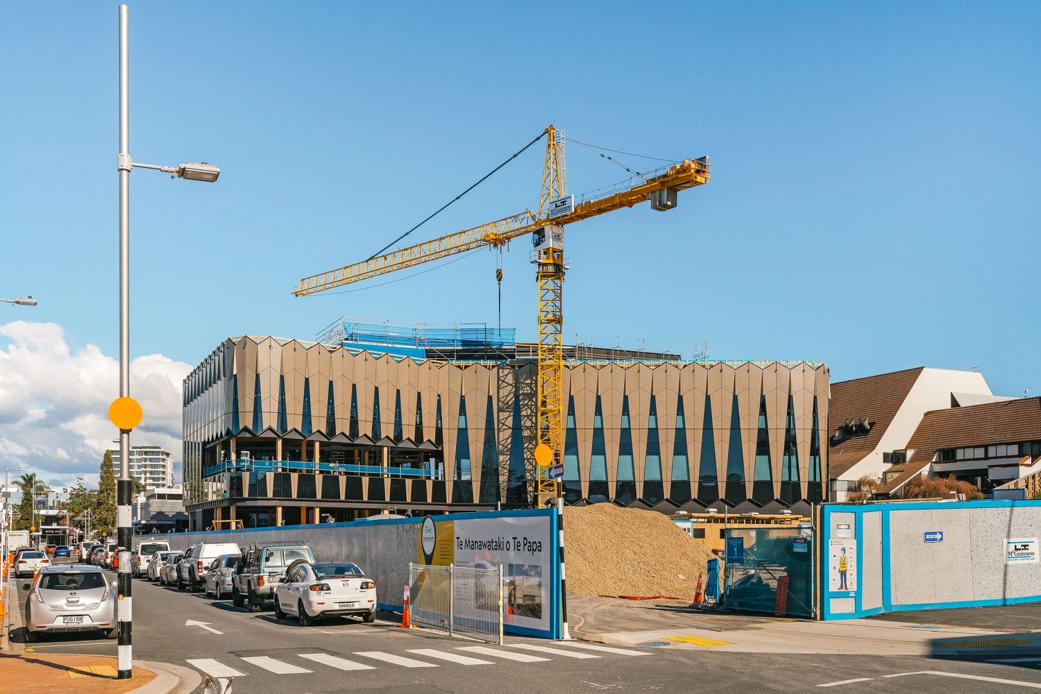 Industrial area with construction site and modern buildings under development.