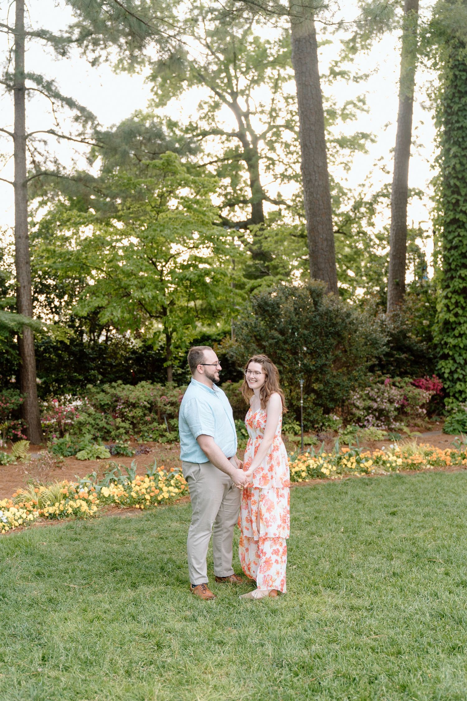 Couple at WRAL Azalea Gardens for engagement photoshoot near Fayetteville, NC