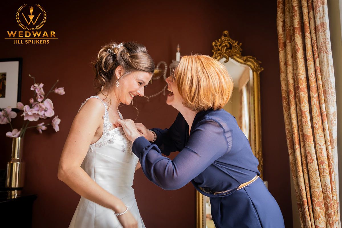 Elegant indoor wedding preparation scene with soft lighting and warm tones.