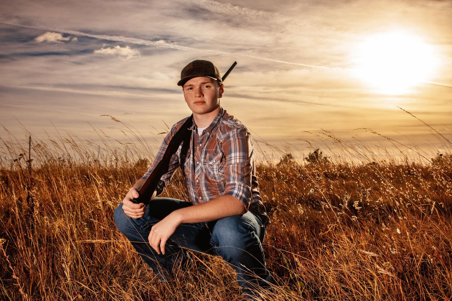 Senior session at sunset. Hunting was his hobby at Lac qui Parle State Park.