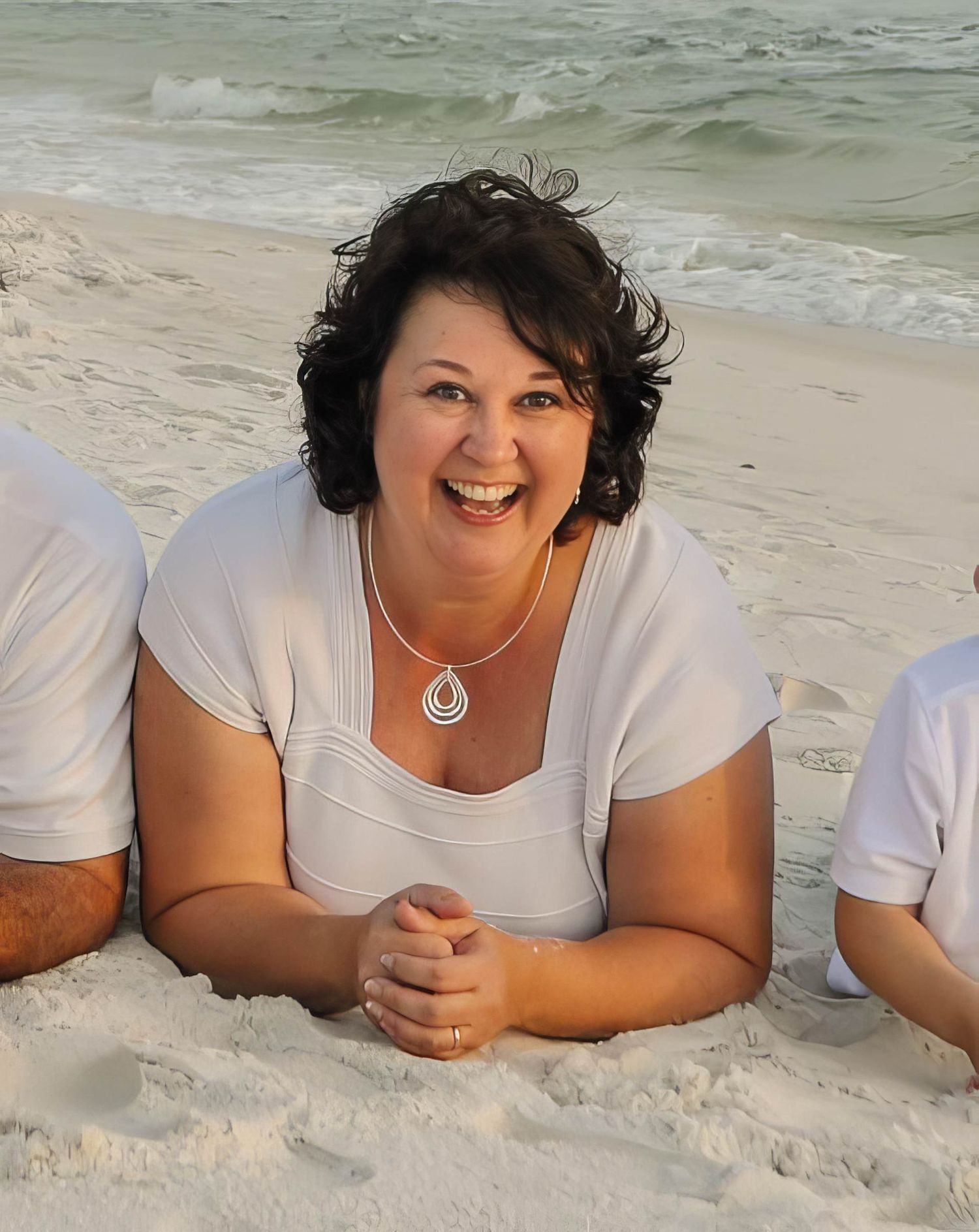 Pensacola portrait photographer Rachel Trippel on Gulf Coast beach—joyful, calm, friendly. Photography by Rachel branding image.