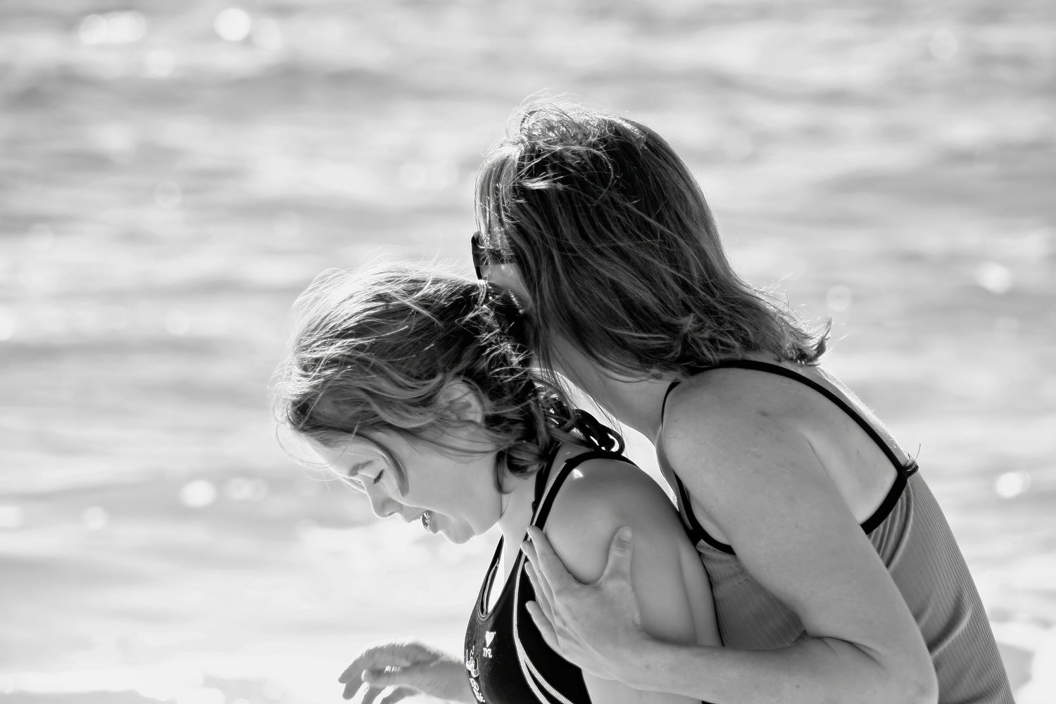 A Mother's Love candid portrait, near Pensacola Beach, FL, Photography by Rachel, Black & White