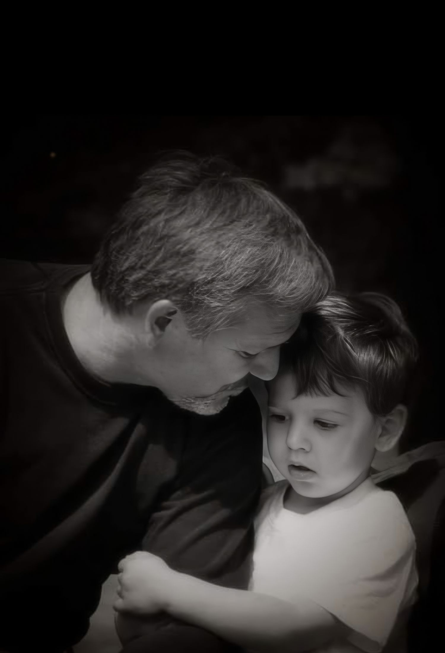 Candid Father & Son portrait in Black & White, near Pensacola, FL, Photography by Rachel