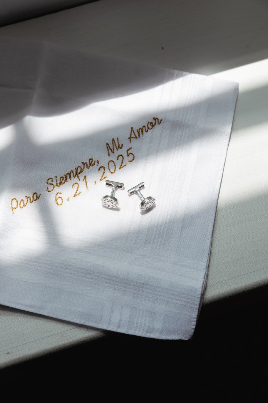 A series of lined notebook paper edges with handwriting showing in natural lighting.