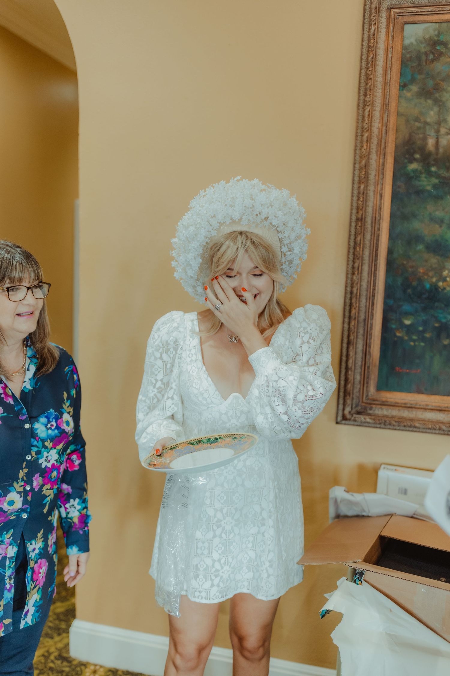 A sequence of poses showing someone wearing a white lace dress with puffed sleeves and a floral print kimono.