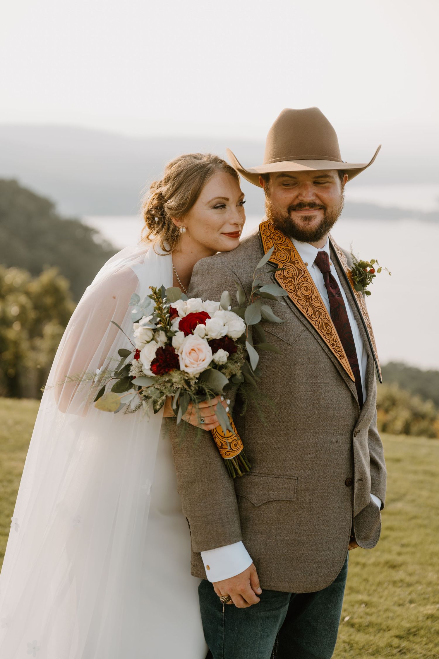 Intimate Western Wedding Couple Portraits at the Barn at Greers Ferry Wedding Venue Near a Lake in Arkansas