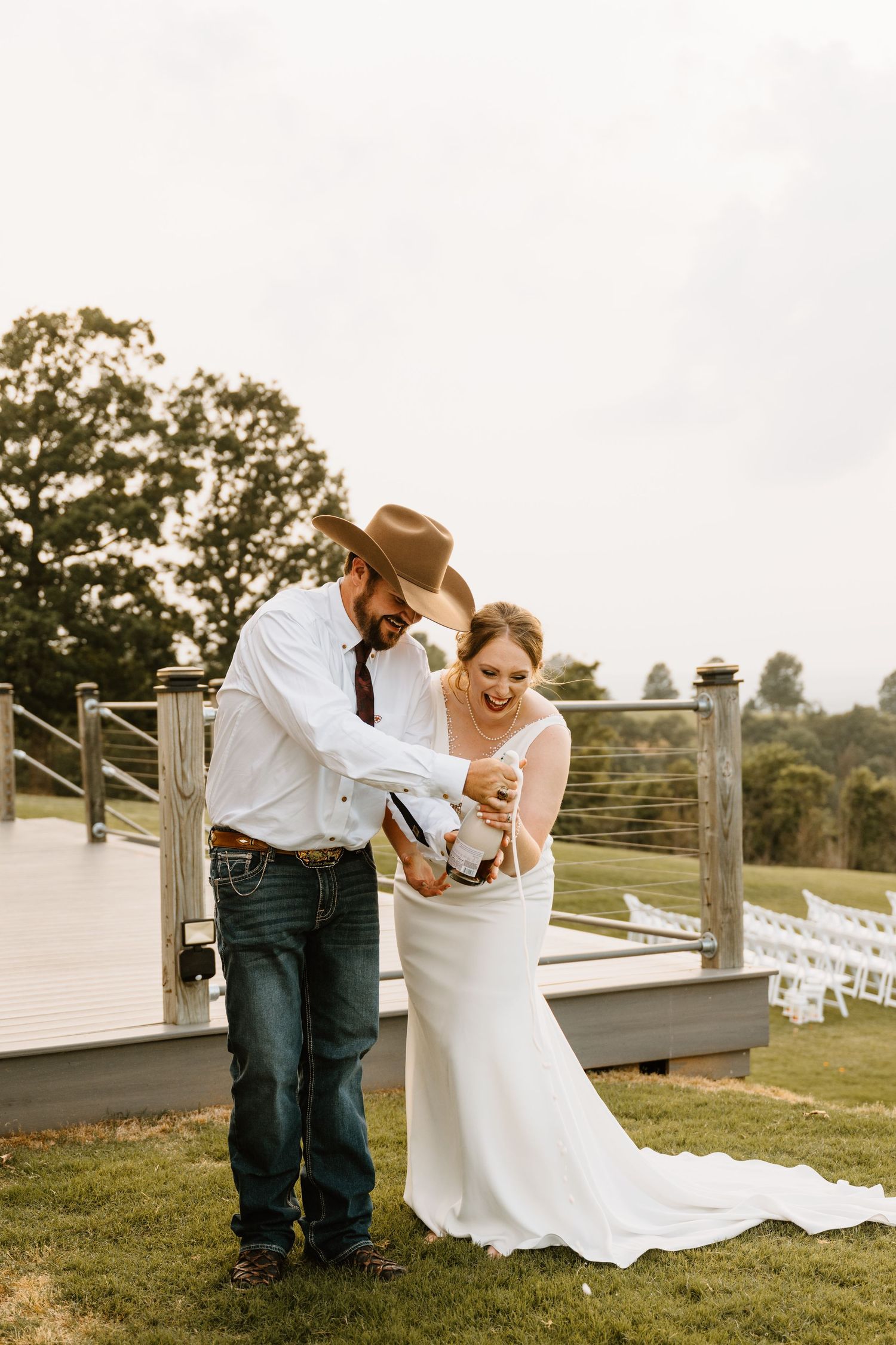 Intimate Western Wedding Couple Reception at the Barn at Greers Ferry Wedding Venue Near a Lake in Arkansas