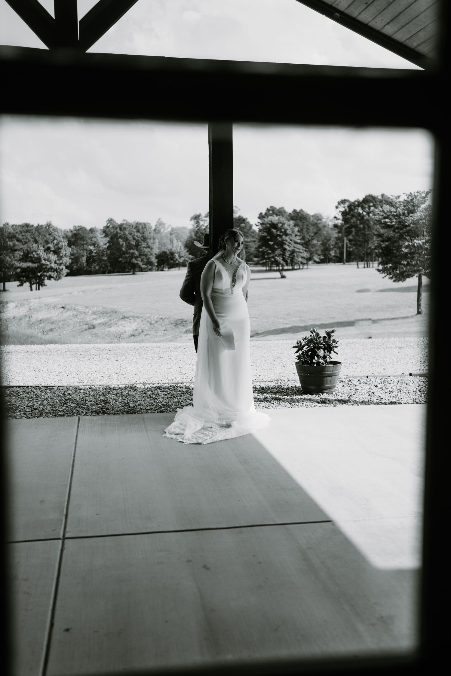 Couple First Look at the Barn at Greers Ferry Wedding Venue Near a Lake in Arkansas