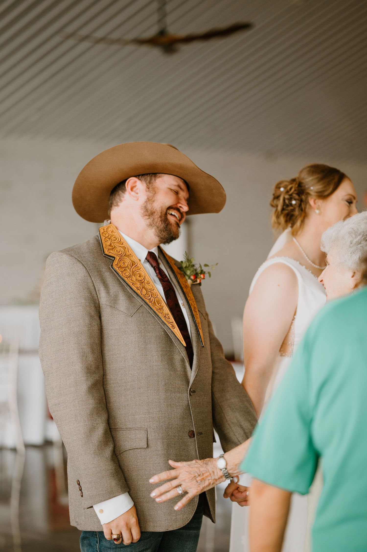 Intimate Western Wedding Couple Reception at the Barn at Greers Ferry Wedding Venue Near a Lake in Arkansas