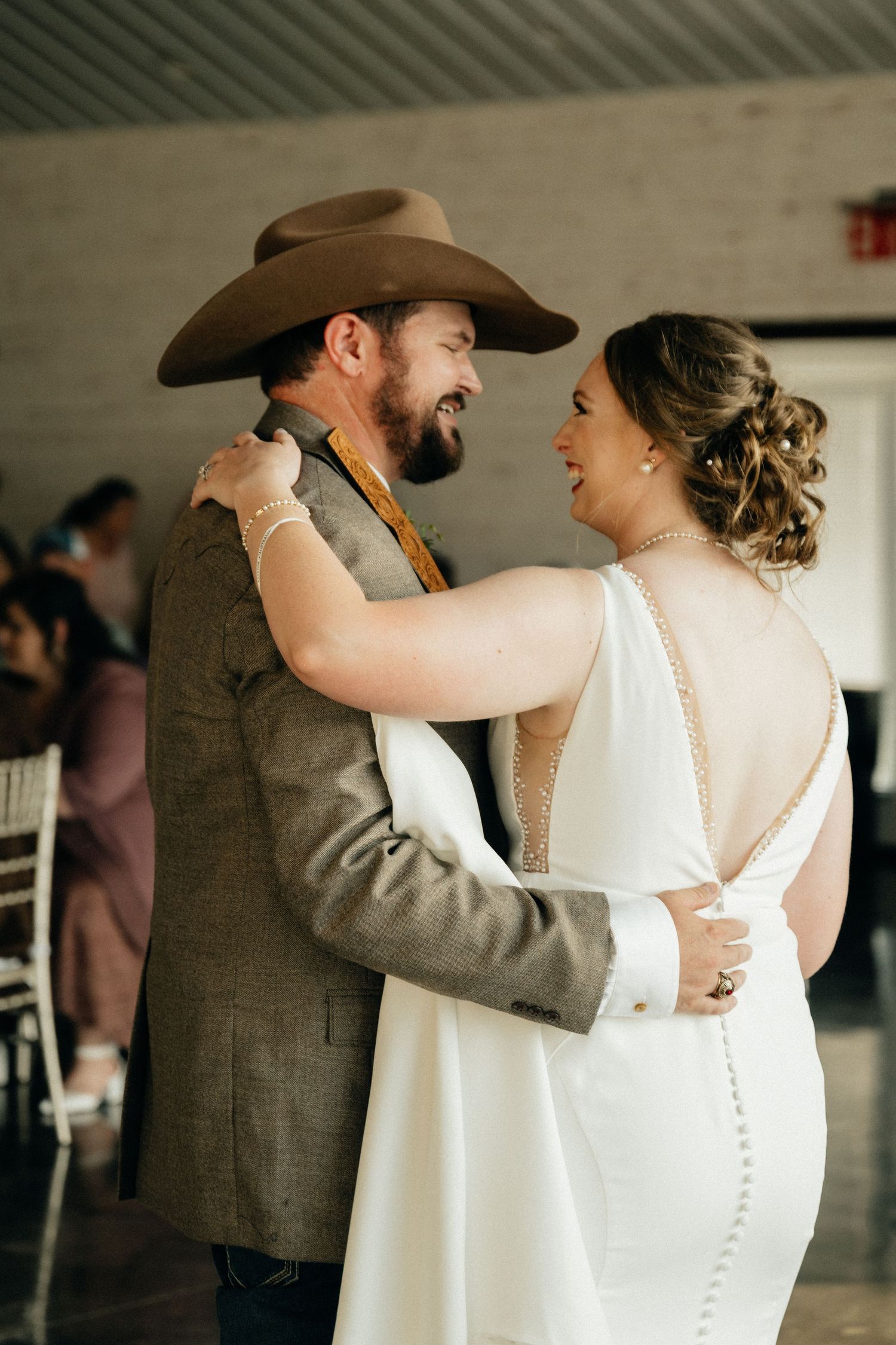 Intimate Western Wedding Couple Reception at the Barn at Greers Ferry Wedding Venue Near a Lake in Arkansas