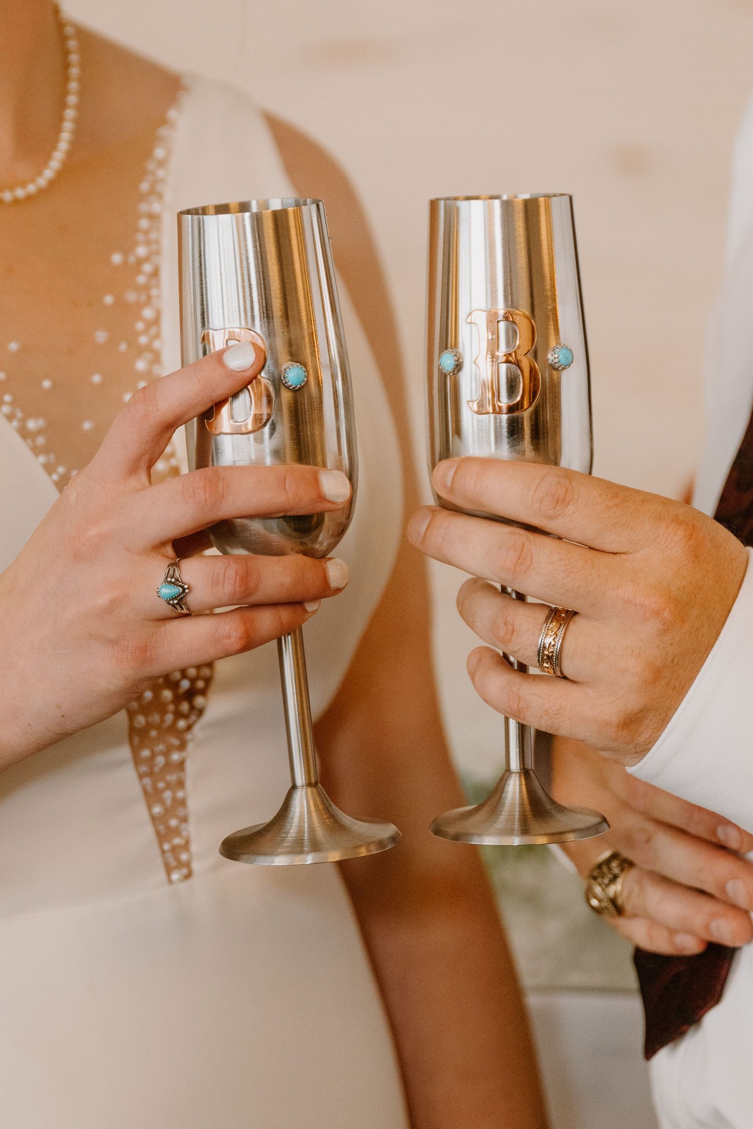 Intimate Western Wedding Couple Reception at the Barn at Greers Ferry Wedding Venue Near a Lake in Arkansas Turquoise Glasses
