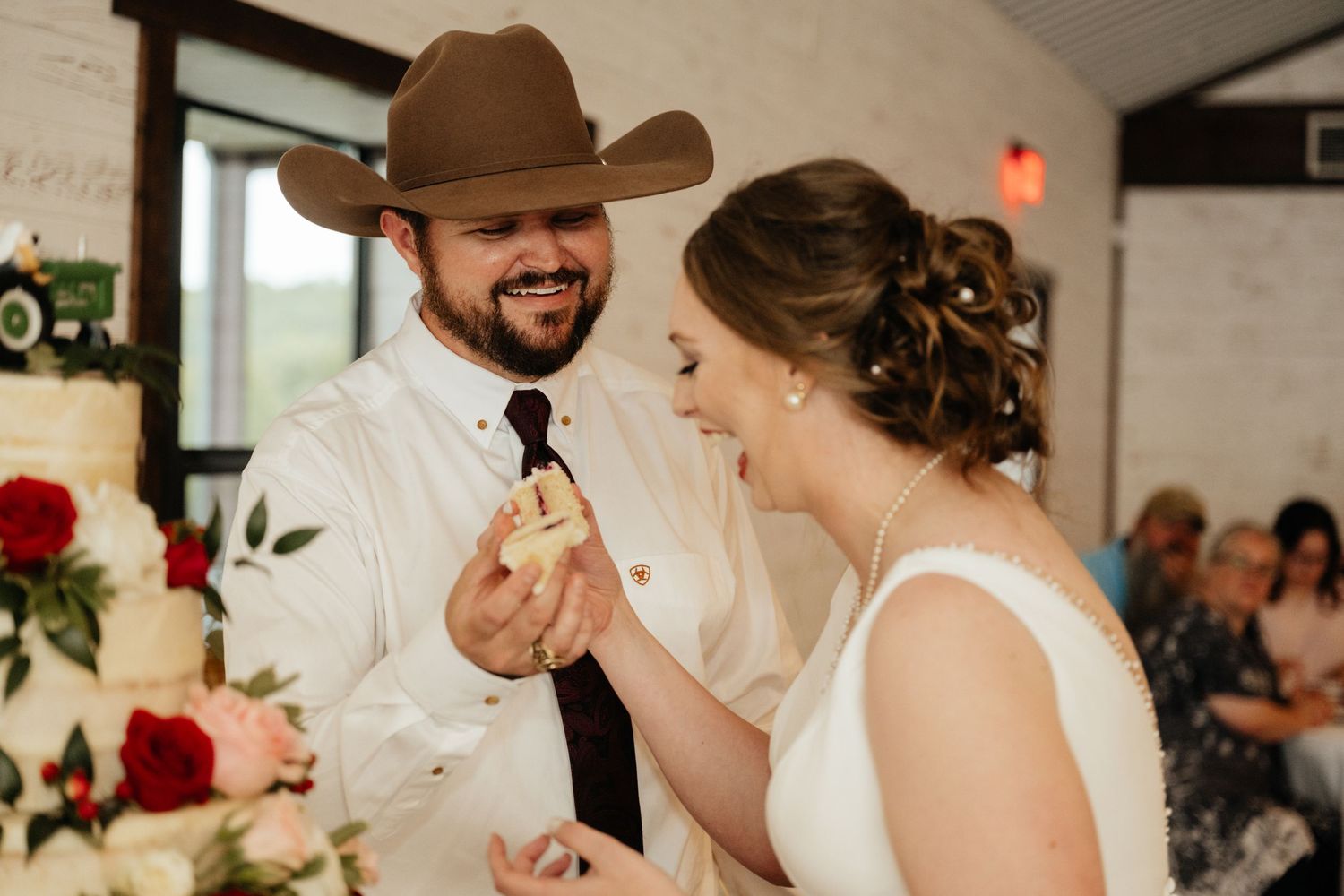 Intimate Western Wedding Couple Reception at the Barn at Greers Ferry Wedding Venue Near a Lake in Arkansas