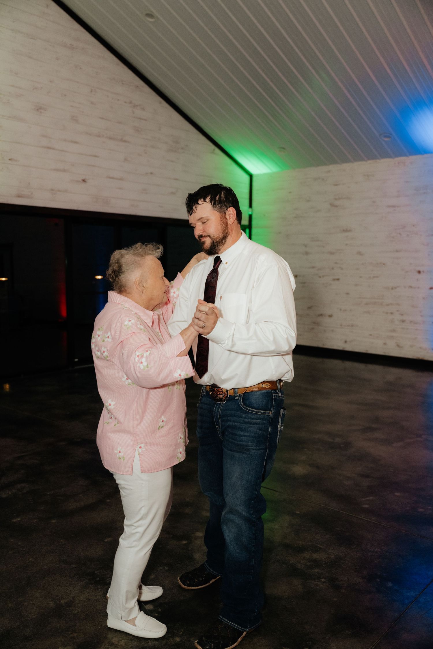 Intimate Western Wedding Couple Reception at the Barn at Greers Ferry Wedding Venue Near a Lake in Arkansas