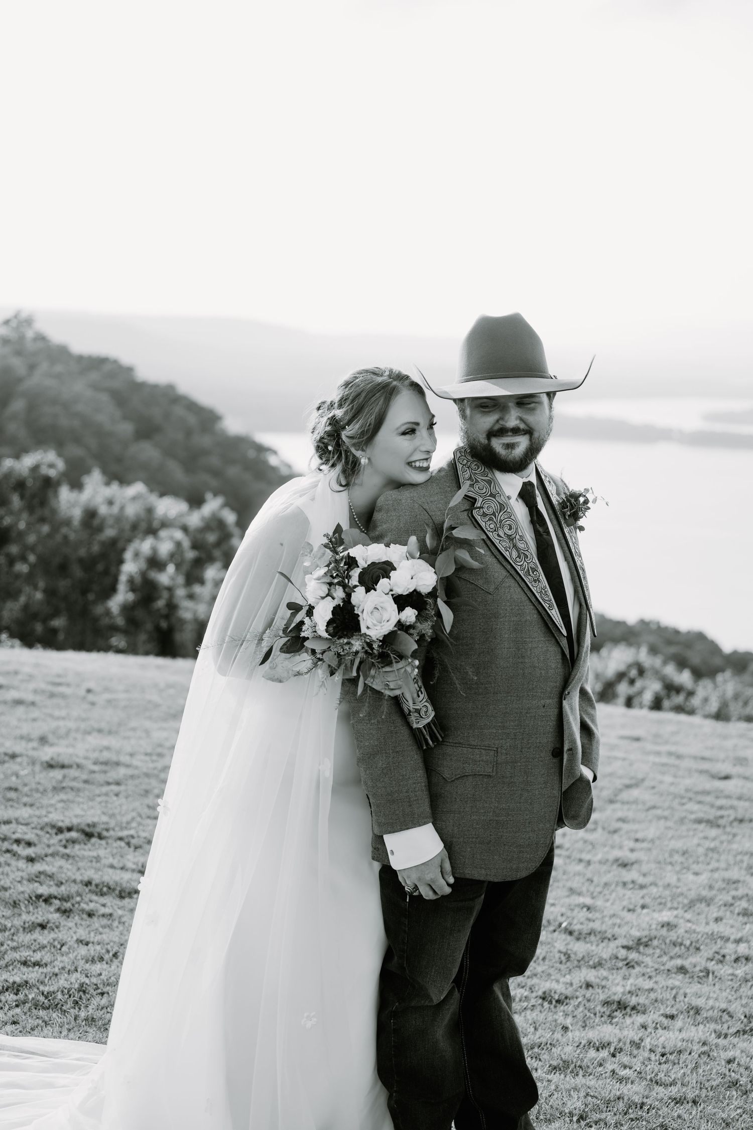 Intimate Western Wedding Couple Portraits at the Barn at Greers Ferry Wedding Venue Near a Lake in Arkansas