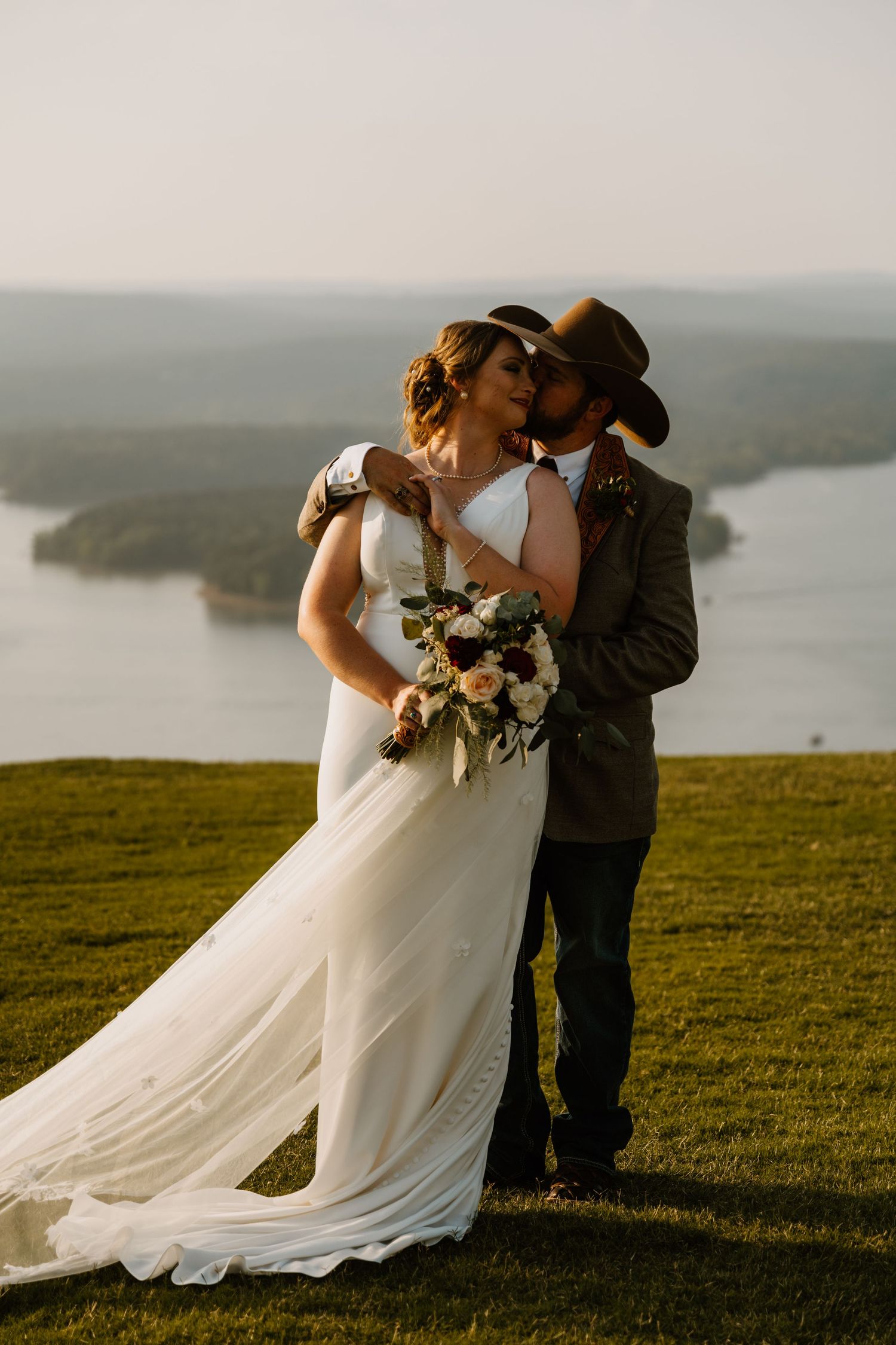 Intimate Western Wedding Couple Portraits at the Barn at Greers Ferry Wedding Venue Near a Lake in Arkansas