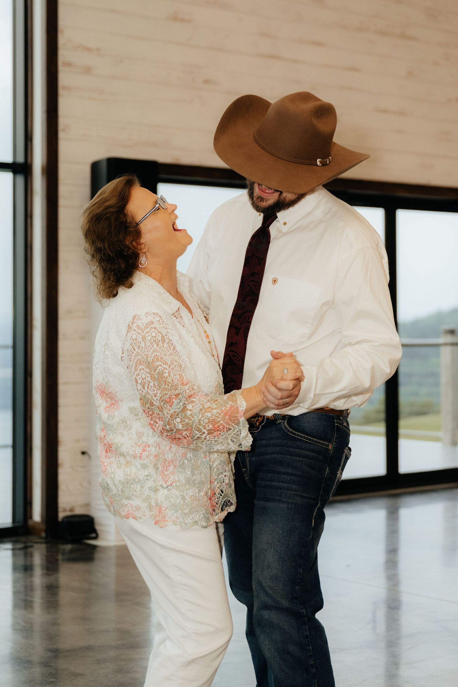 Intimate Western Wedding Couple Reception at the Barn at Greers Ferry Wedding Venue Near a Lake in Arkansas