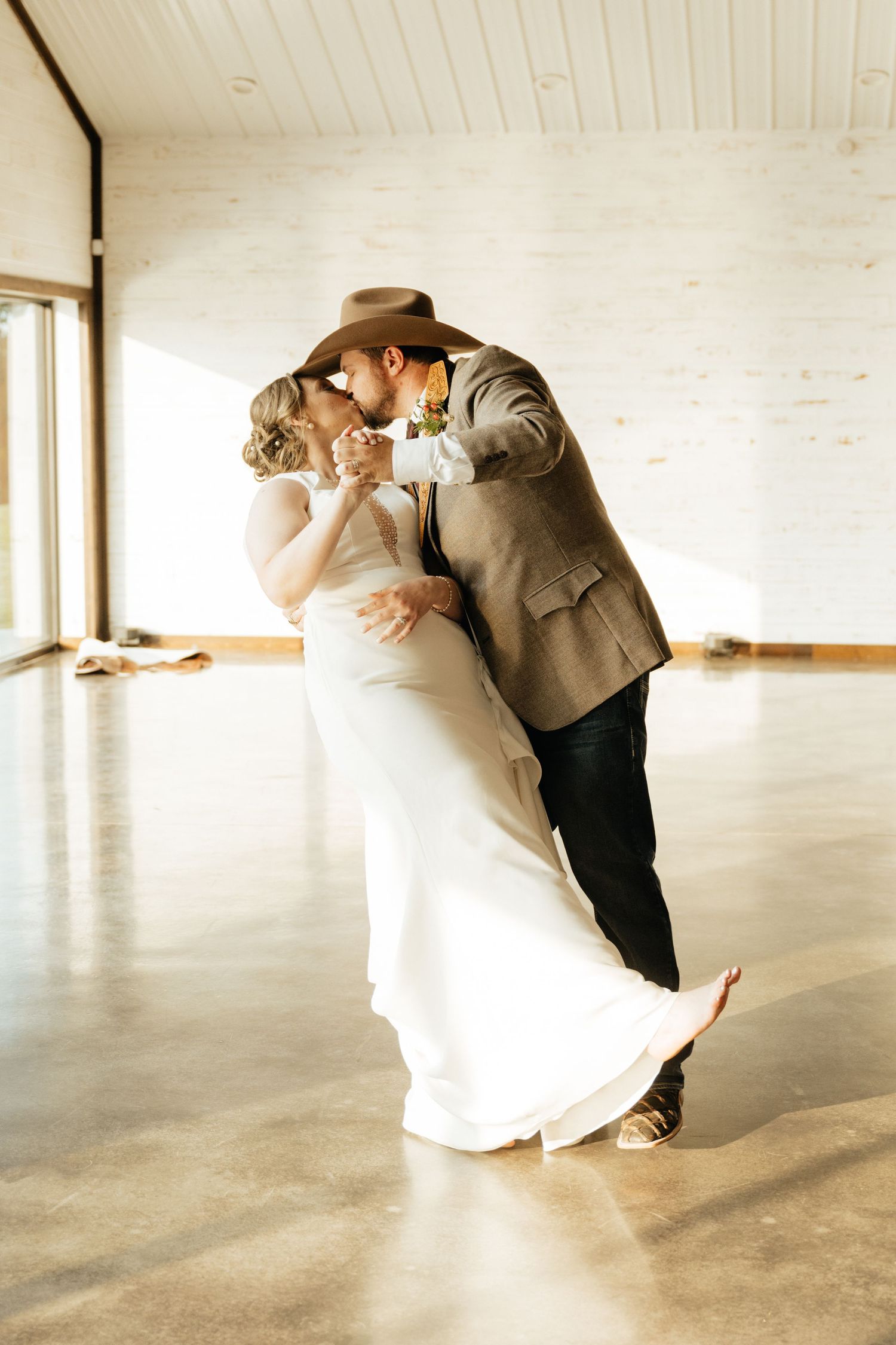 Intimate Western Wedding Couple Reception at the Barn at Greers Ferry Wedding Venue Near a Lake in Arkansas