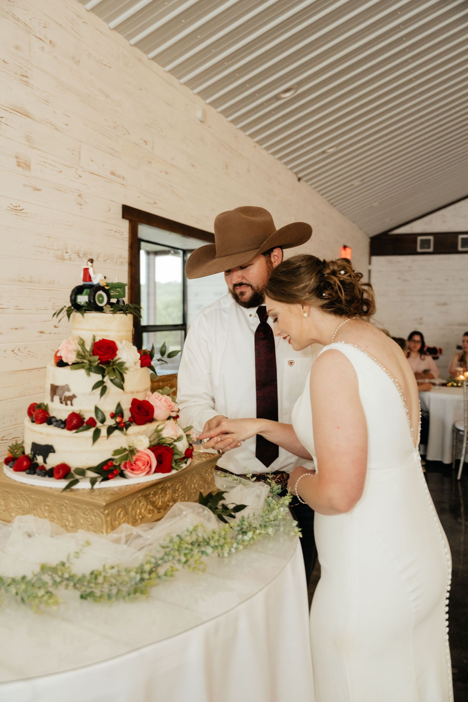 Intimate Western Wedding Couple Reception at the Barn at Greers Ferry Wedding Venue Near a Lake in Arkansas