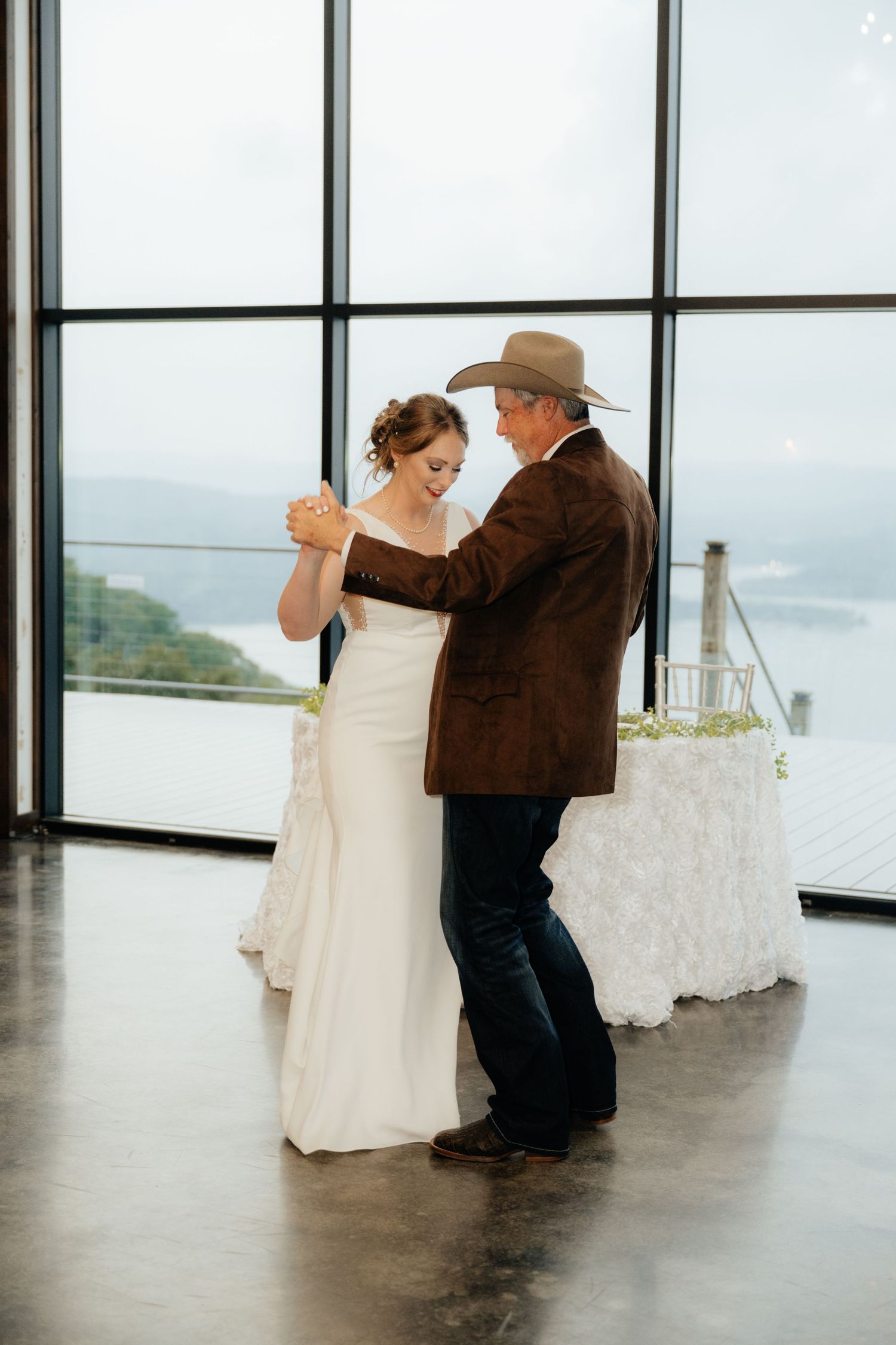 Intimate Western Wedding Couple Reception at the Barn at Greers Ferry Wedding Venue Near a Lake in Arkansas