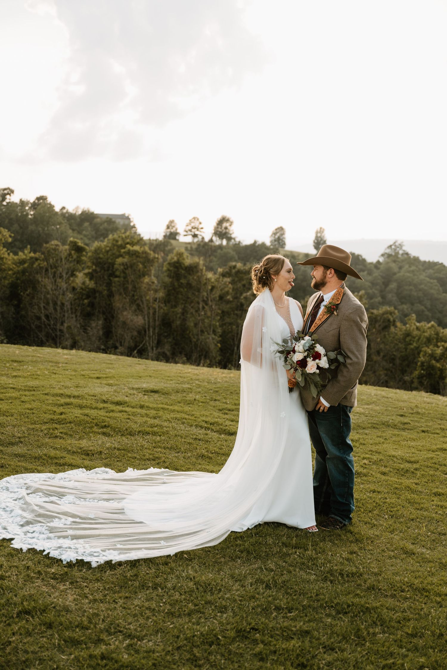 Intimate Western Wedding Couple Portraits at the Barn at Greers Ferry Wedding Venue Near a Lake in Arkansas