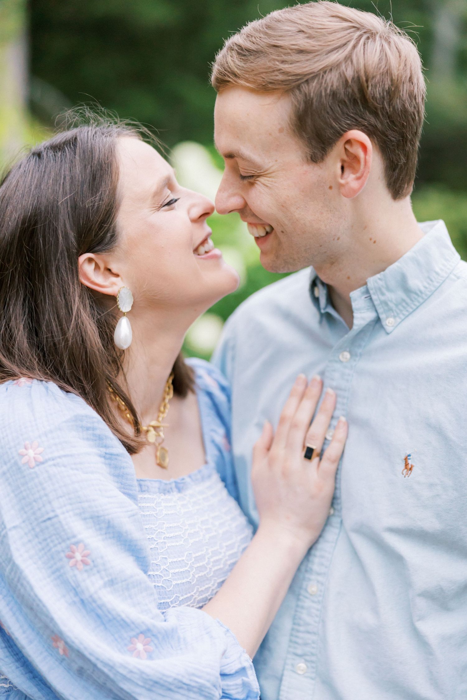 Intimate moment between couple sharing loving embrace outdoors.