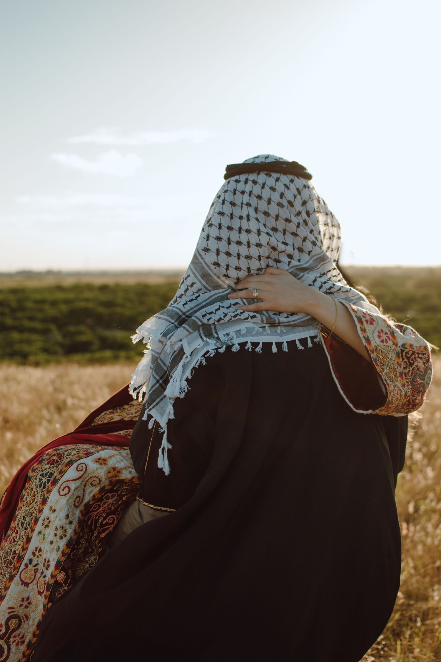 traditional Palestinian henna wedding attire thobe red henna thobe inspiration elegant henna traditional Palestinian checkered scarf keffiy