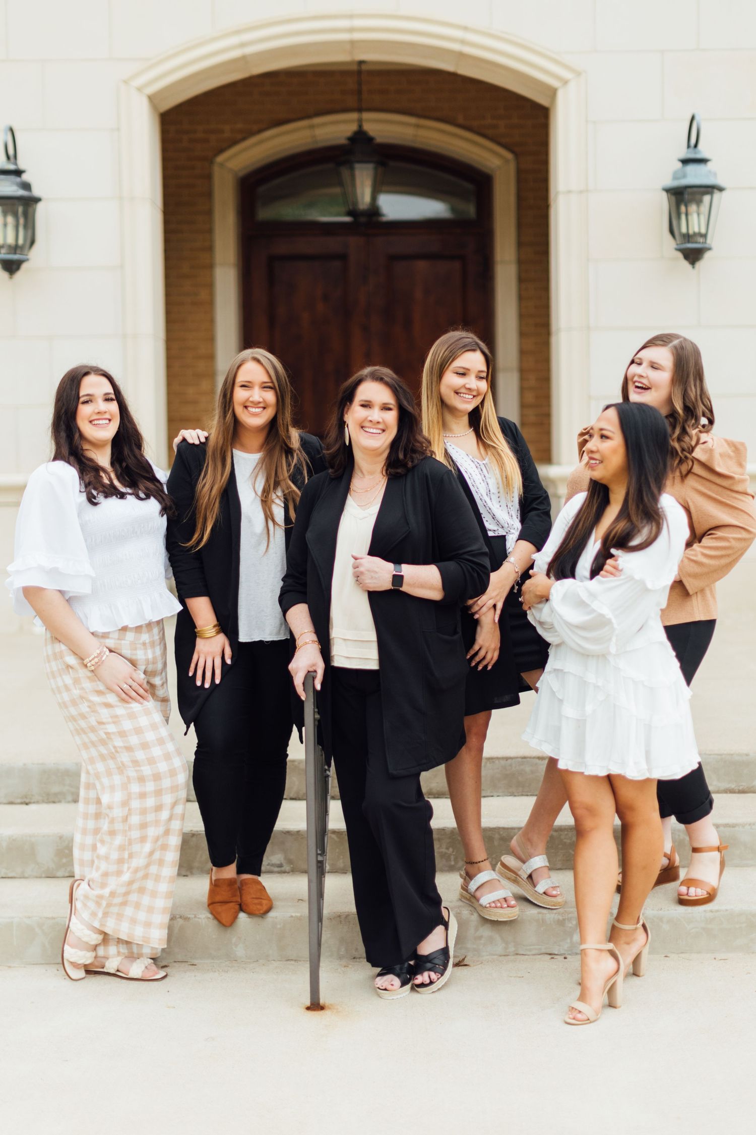Professional photo collage showing women in business casual attire sitting and posing on steps of a building.