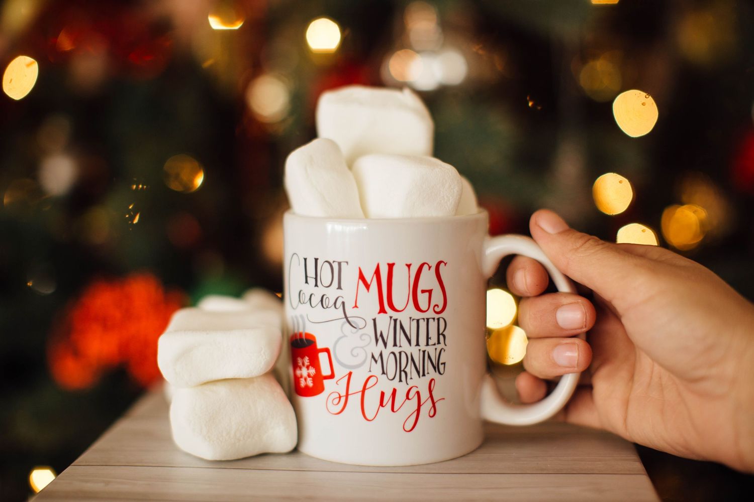 Two white ceramic mugs with
