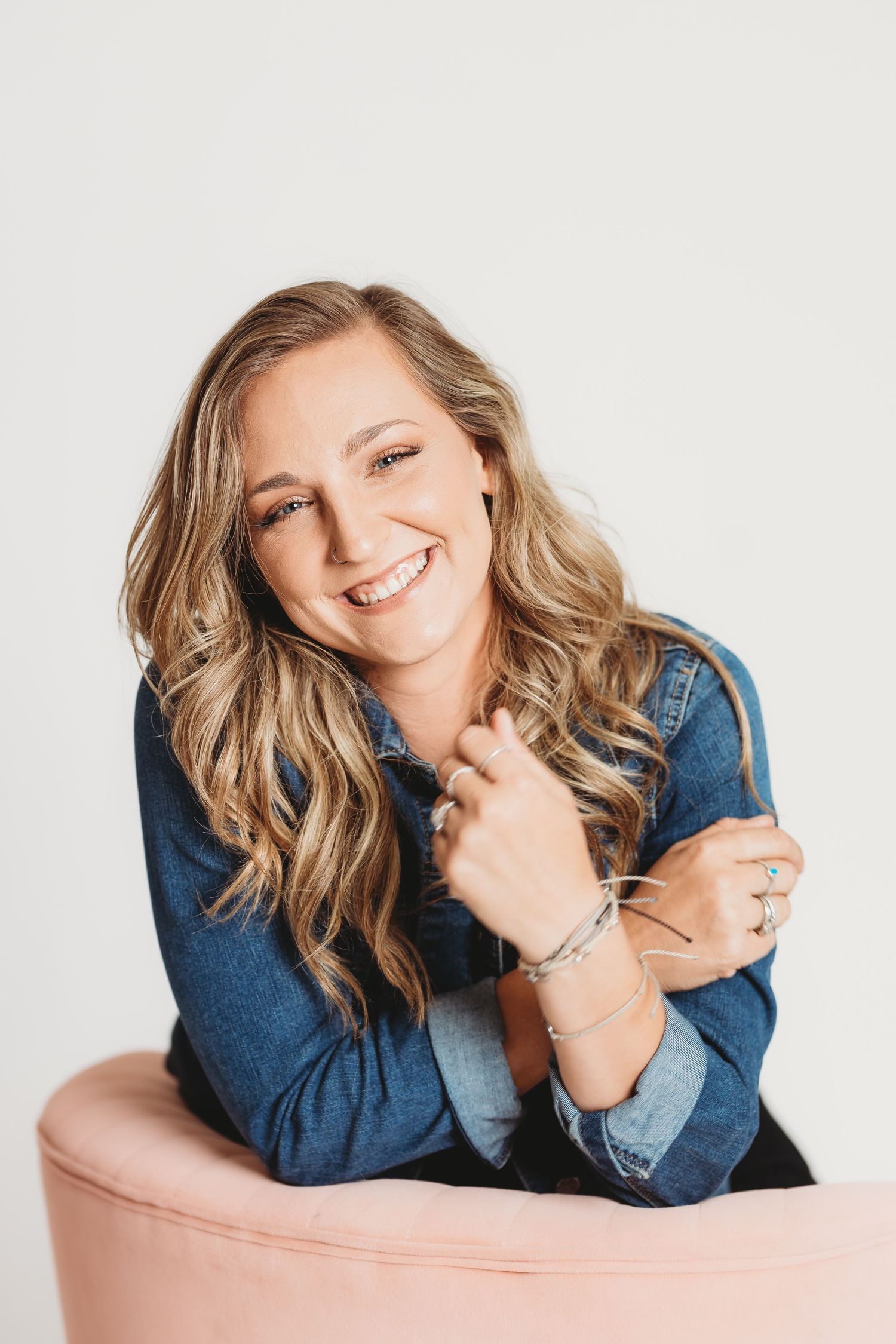 Portrait series showing joyful expressions against white studio backdrop.