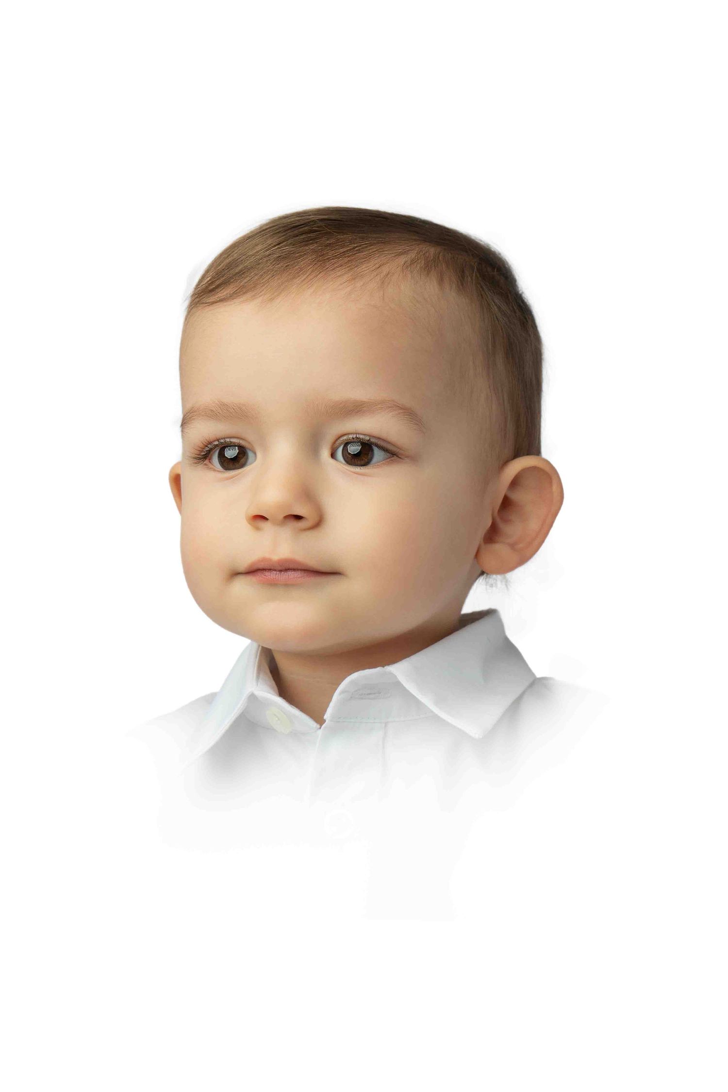 toddler boy looks off camera in heirloom portrait