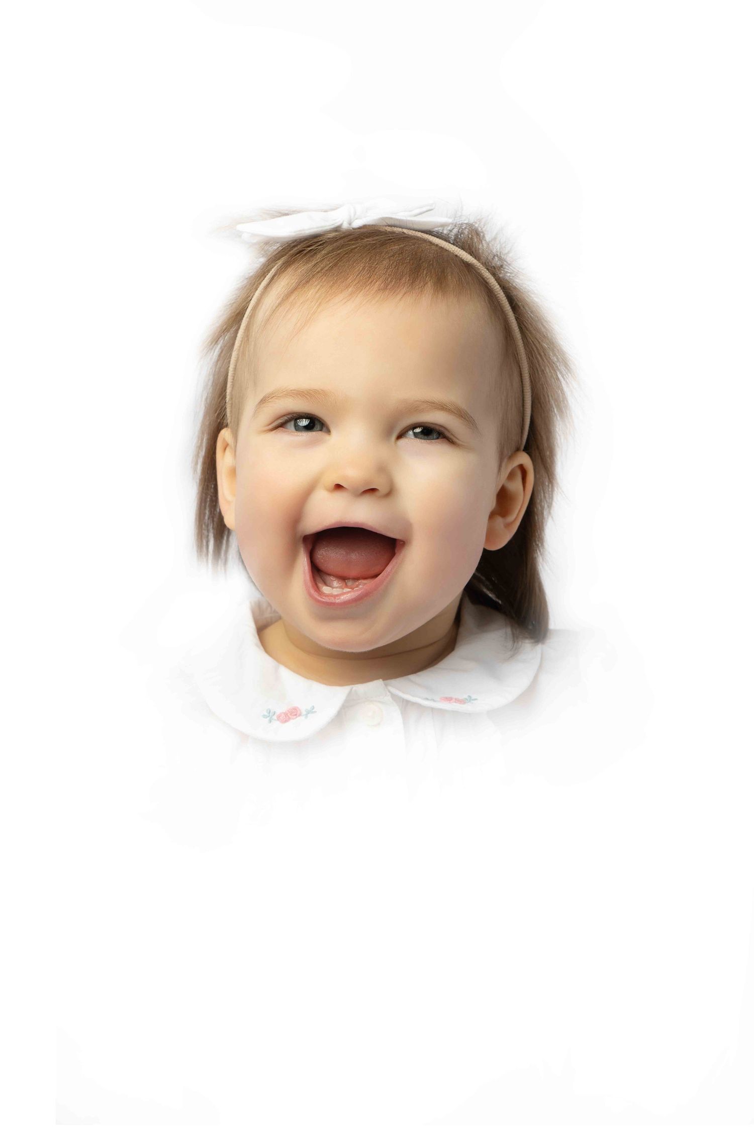 baby laughs in heirloom portrait