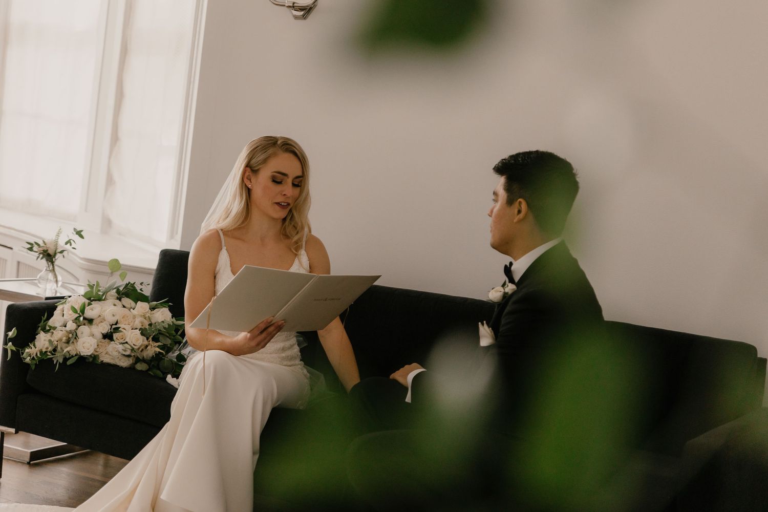 Bride reading to groom