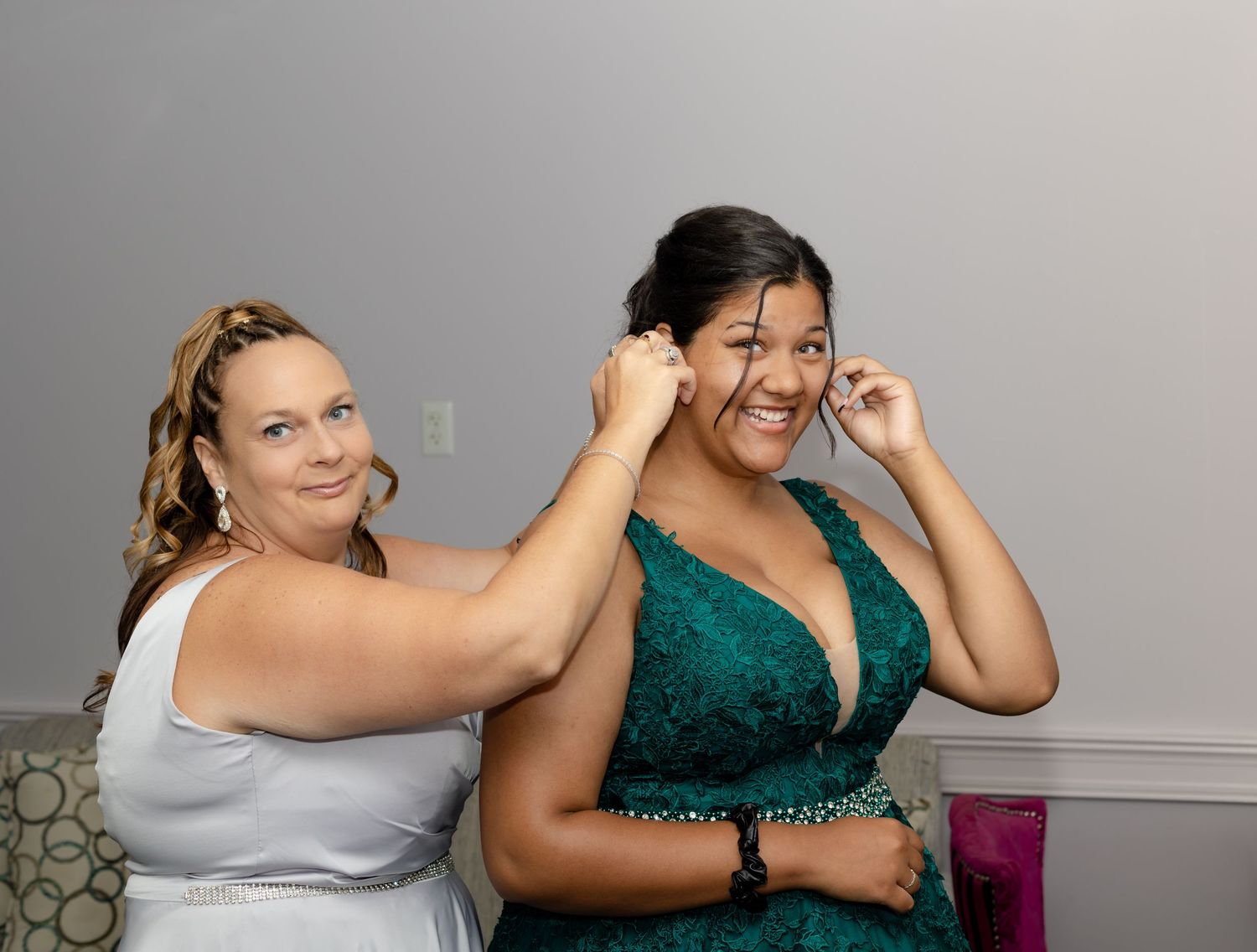 A series of candid moments from a celebration against a gray backdrop.