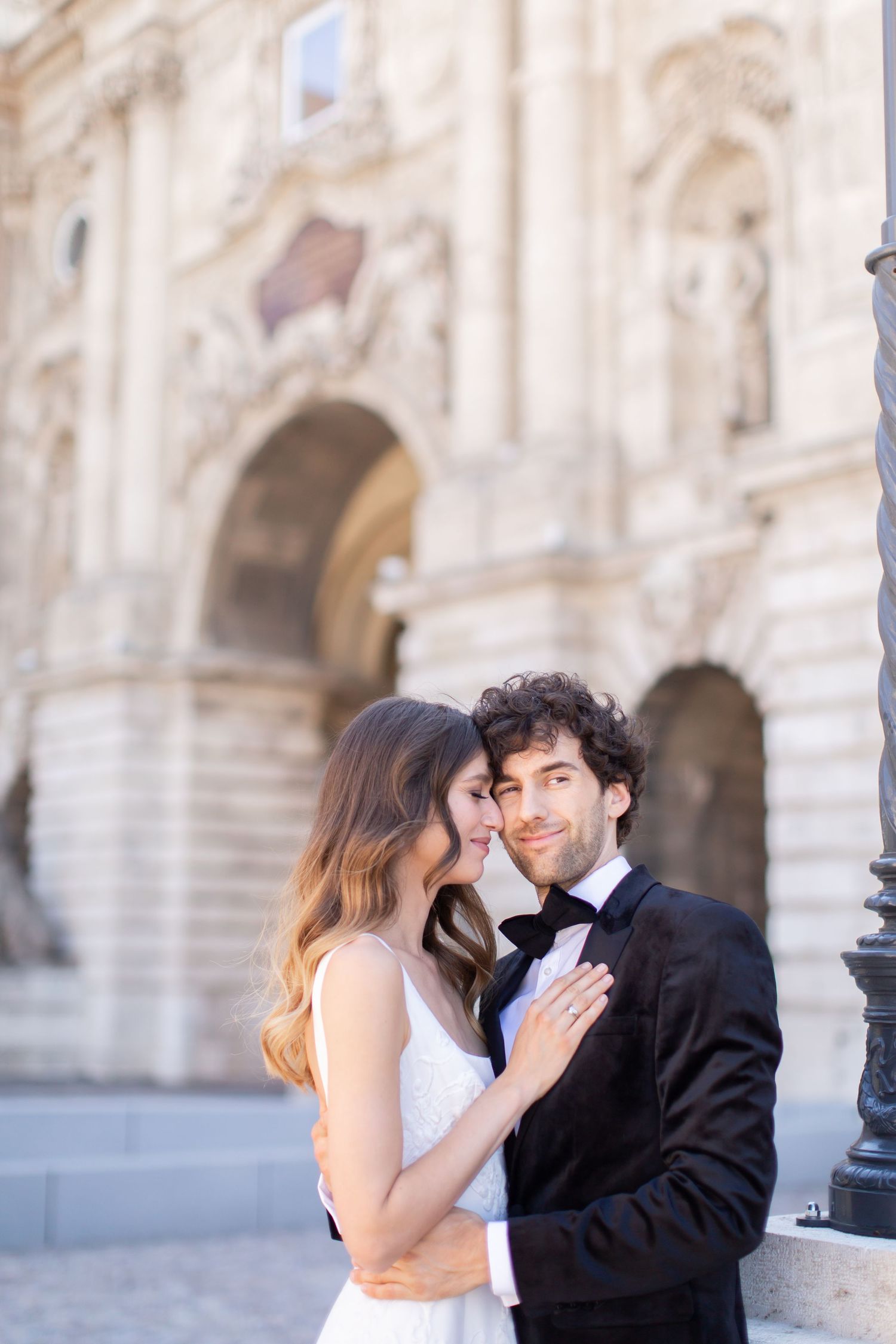 bride-and-groom-with-budapest-city-view-at-fishermans-bastion-destination-wedding-photo.jpg