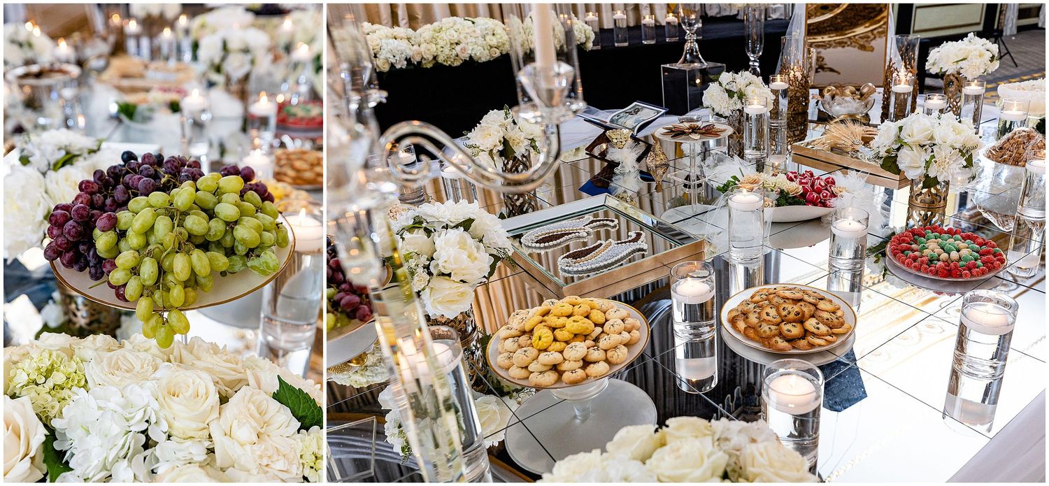 Luxurious wedding reception food display featuring fresh fruit, appetizers, and elegant presentation.