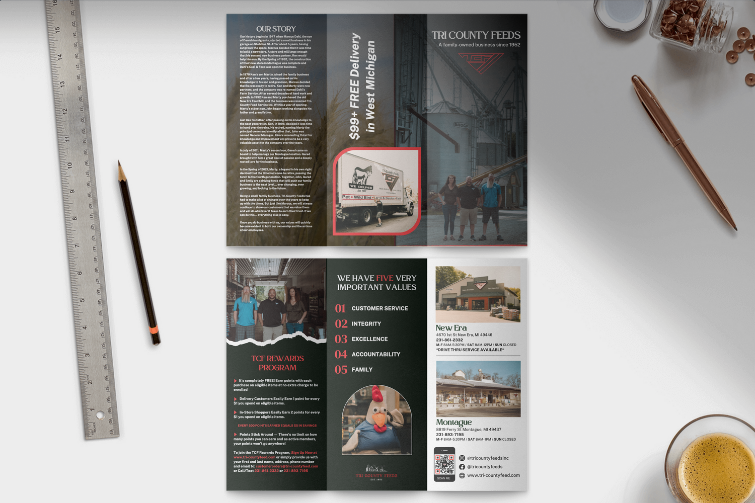 A flat lay of marketing materials including brochures and design elements on a white surface.