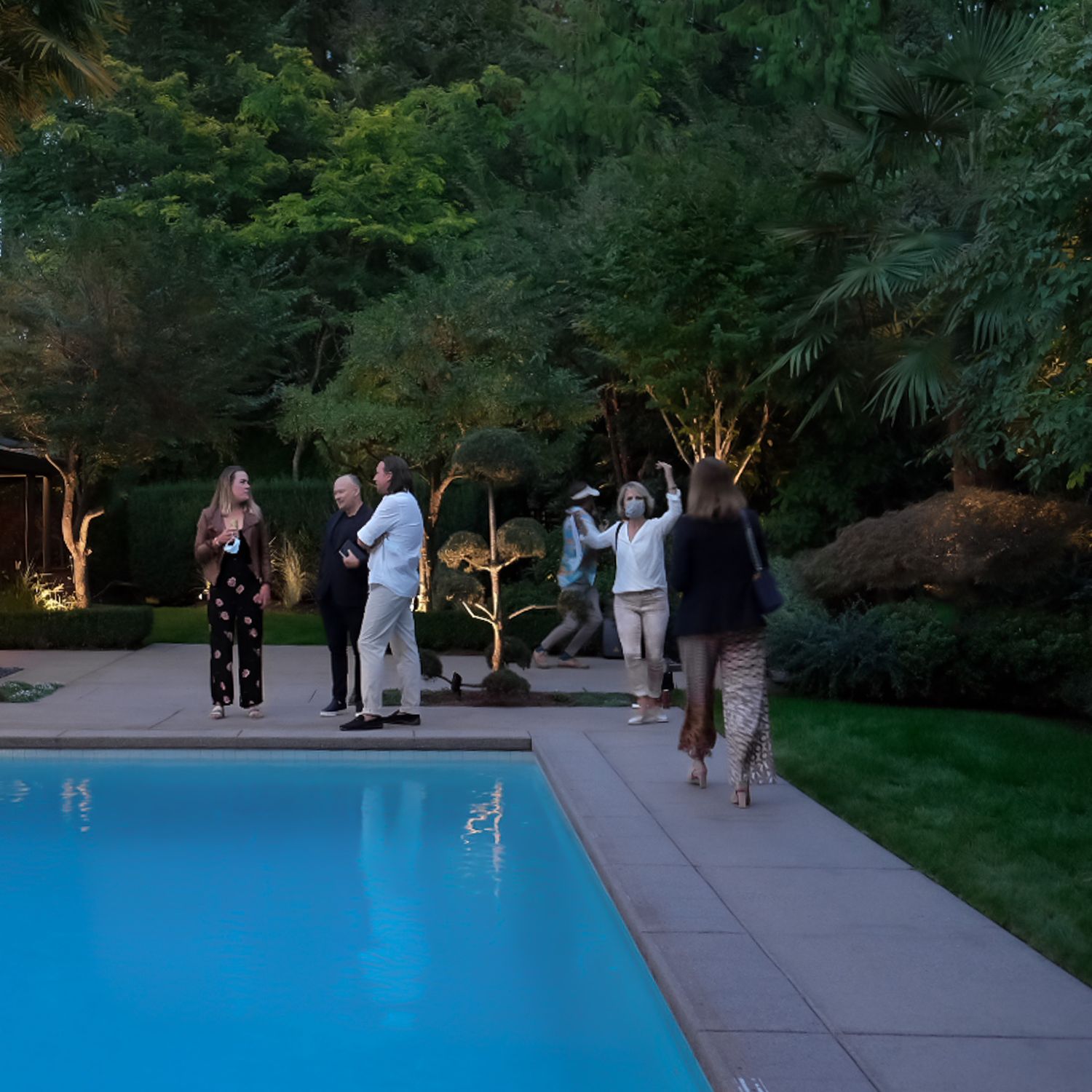 Event photography at outdoor venue with swimming pool at dusk, North Vancouver photographer