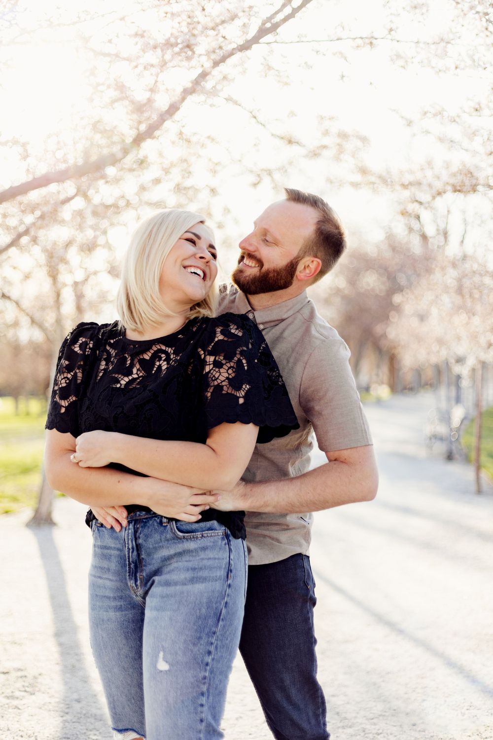 elegant couple laughing candidly photographed by missouri wedding photographer