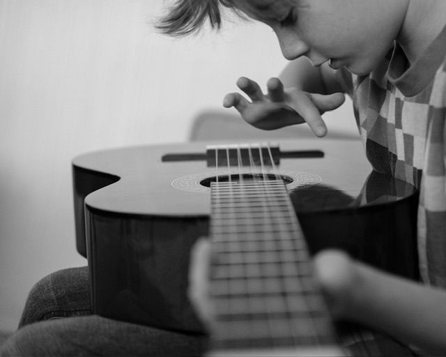 Portrait photography session, child playing guitar North Vancouver photographer