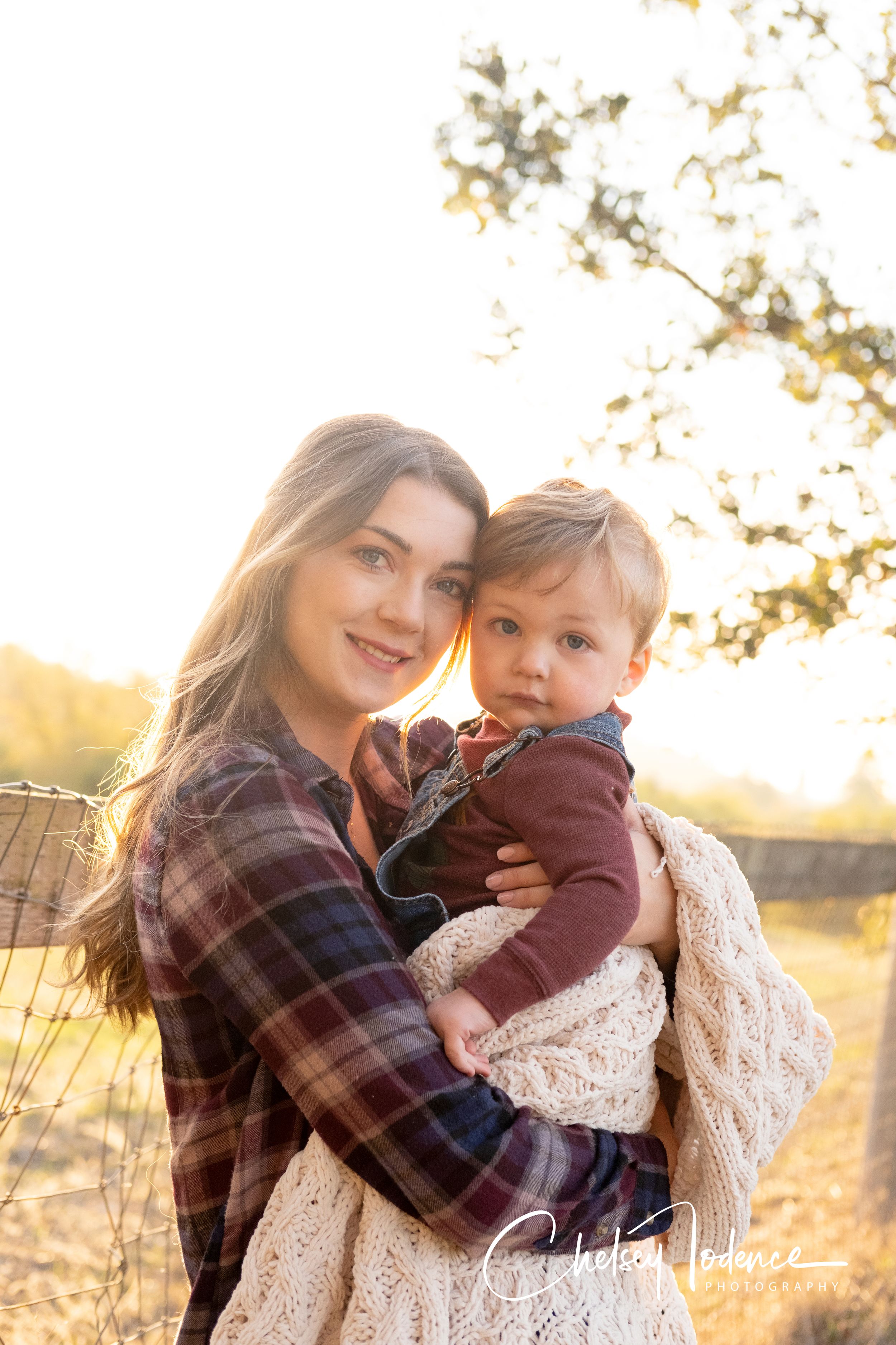 Motherhood photos Sophie cuddling Jake at Crossroads Ranch